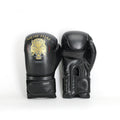 Boys Muay Thai Boxing Training With A Punching Bag And Gloves