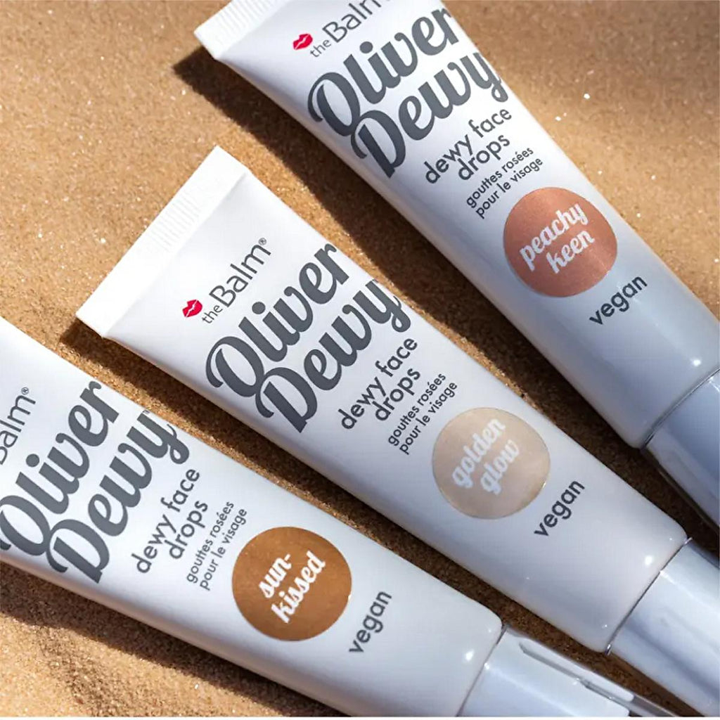 theBalm Oliver Dewy Face Drops Highlighter - Golden Glow: Achieve Radiant, Luminous Skin with this Illuminating Liquid Makeup
