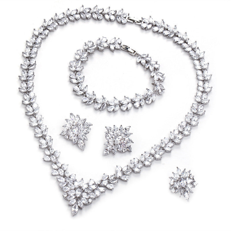 The Dazzling Set Is Handcrafted With Copper And Set With Zircon Stones.